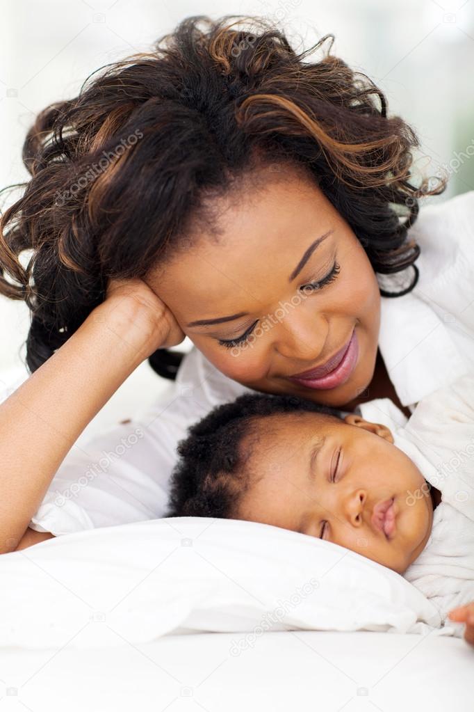 African American Mother Sleeping With Baby Girl  Stock -4802
