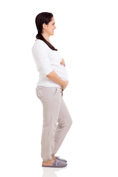 Glad gravid kvinna sidovy — Stockfoto