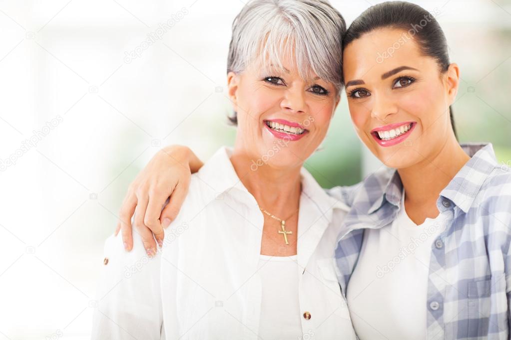 mature mother and young daughter portrait