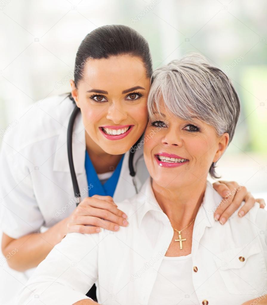 friendly nurse and senior patient