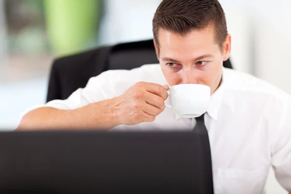 Business executive having coffee — Stock Photo, Image