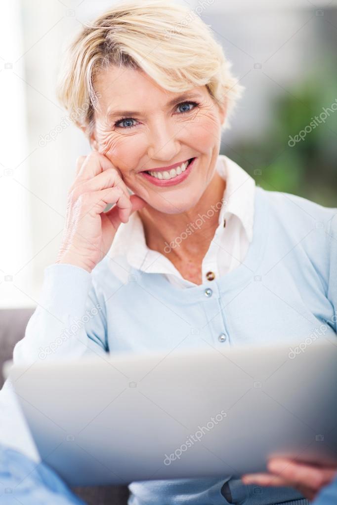 Attractive Middle Aged With Laptop Computer Attractive Middle Aged With Laptop Computer Stock
