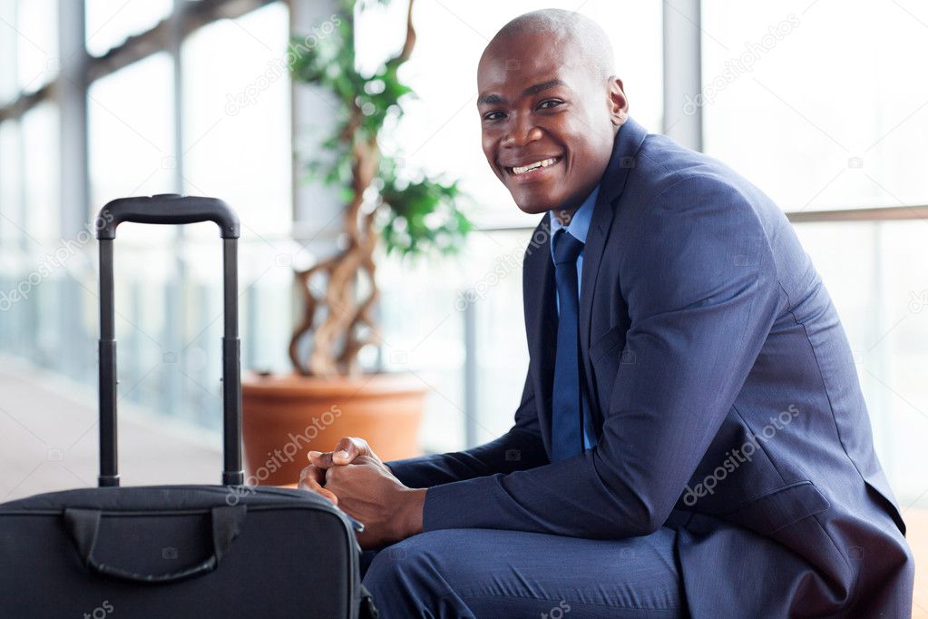 african american businessman waiting in airport