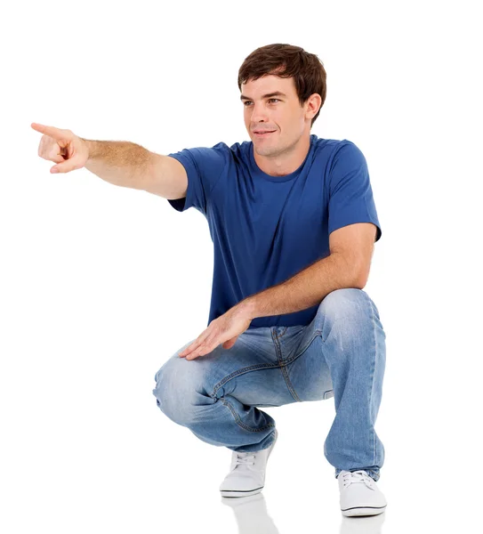 Young man pointing — Stock Photo, Image