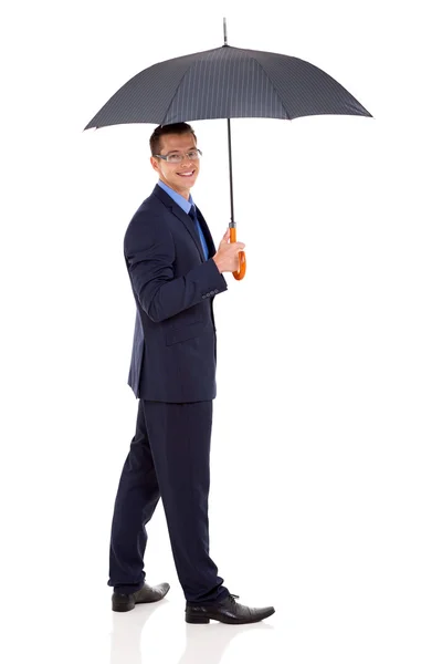 Homme d'affaires tenant parapluie — Photo