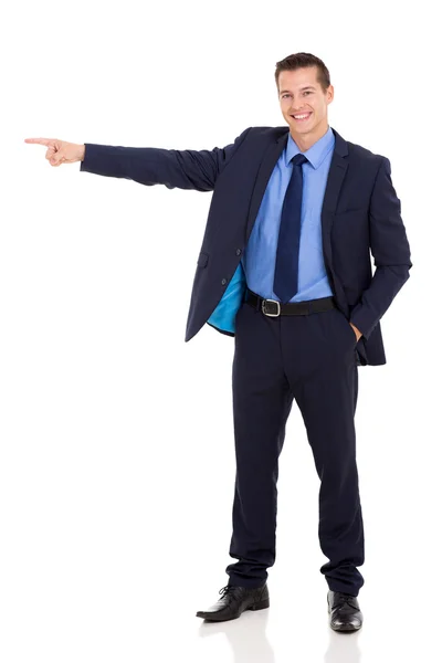 Young businessman pointing Royalty Free Stock Photos