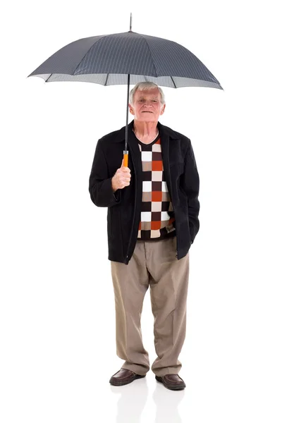 Retired man holding umbrella — Stock Photo, Image