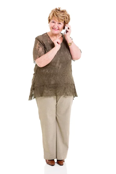 Retired elderly woman talking on mobile phone — Stock Photo, Image