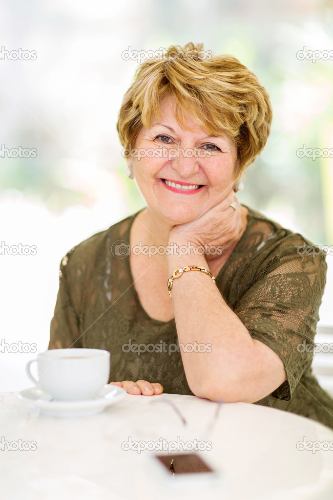 senior woman sitting at home