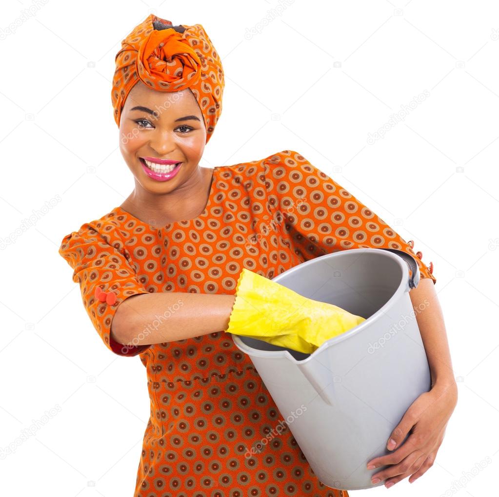 african woman with cleaning tools