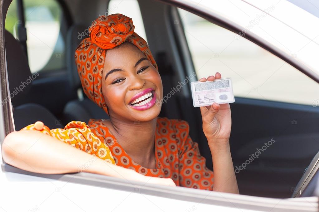 african american woman showing a driving license
