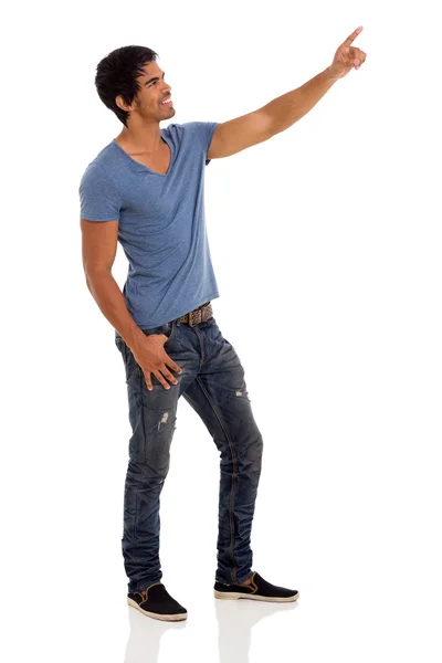 Young indian guy pointing up — Stock Photo, Image