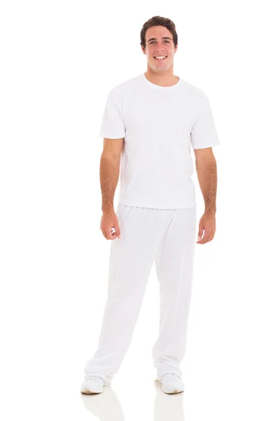 Jonge mens in witte kleren — Stockfoto