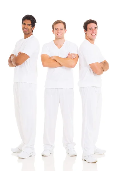 Group of friends with arms crossed — Stock Photo, Image