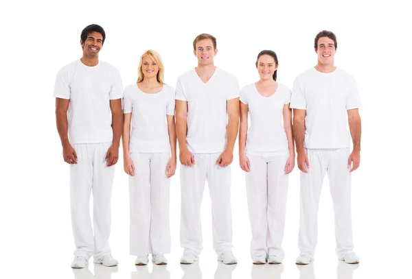 Група друзів, що стоять на білому — стокове фото