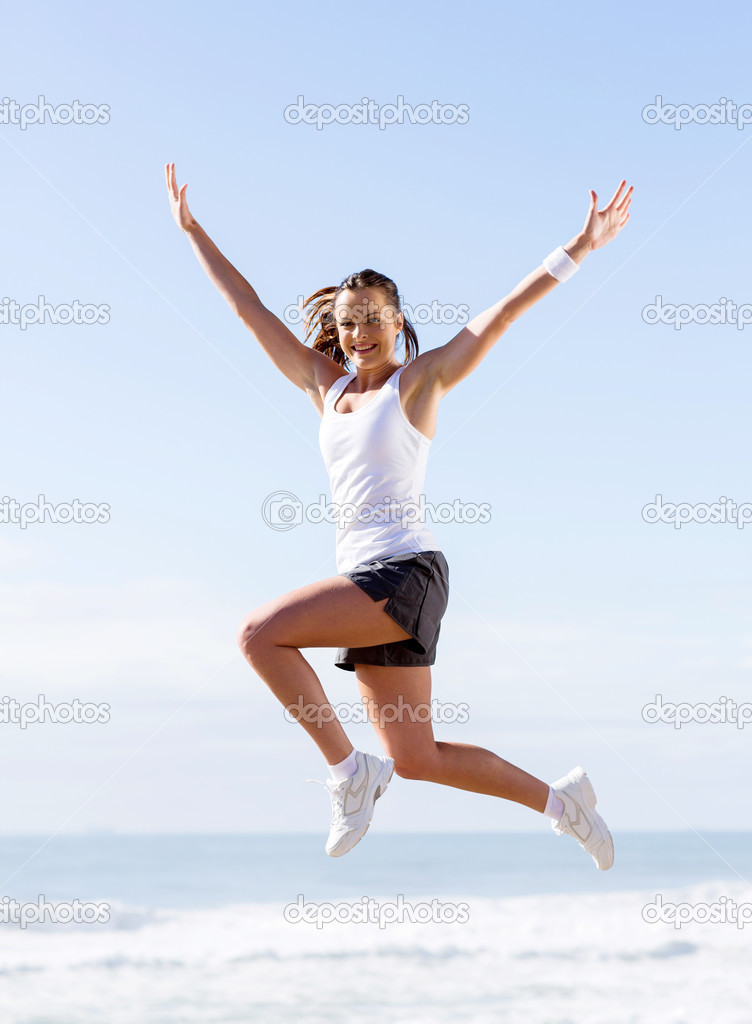active young woman jumping