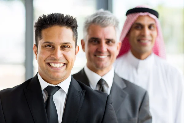 Businessmen standing in a row — Stock Photo, Image