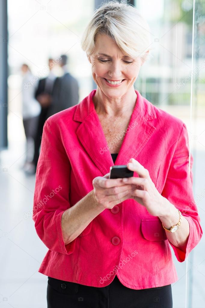 Senior businesswoman using smartphone