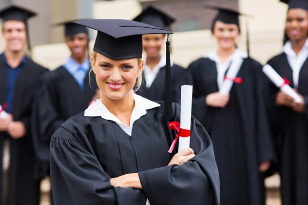 College graduate with arms crossed Stock Photo