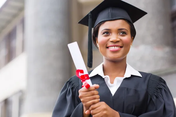 Afro american graduate holding diploma — Stock Photo, Image