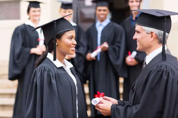 Pretty african student receiving certificate — Stock Photo, Image