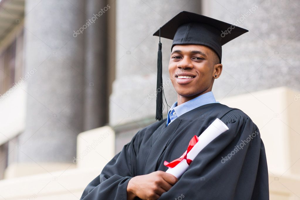 African Graduate Standing Outside College Stock Photo By ©michaeljung