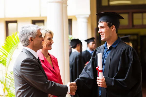 Father congratulating his son — Stock Photo, Image