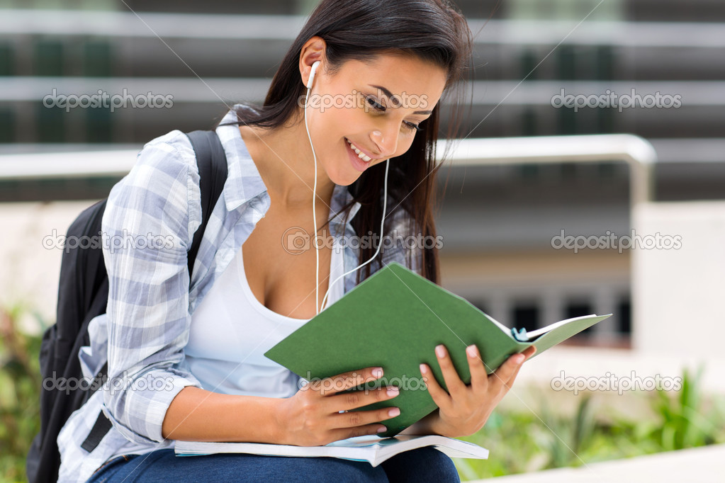 college student reading a book