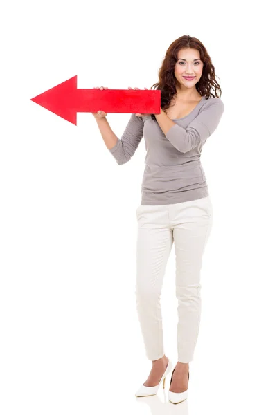 Woman holding red arrow — Stock Photo, Image