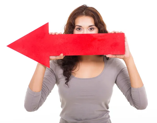Young girl holding red arrow — Stock Photo, Image