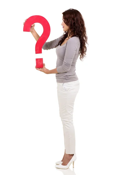 Side view of woman holding question mark — Stock Photo, Image