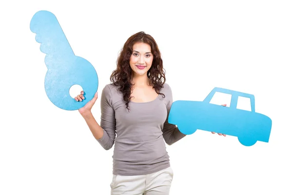 Young woman holding paper car and key symbol — Stock Photo, Image