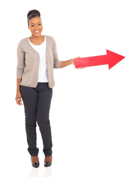 Black girl with direction arrow — Stock Photo, Image