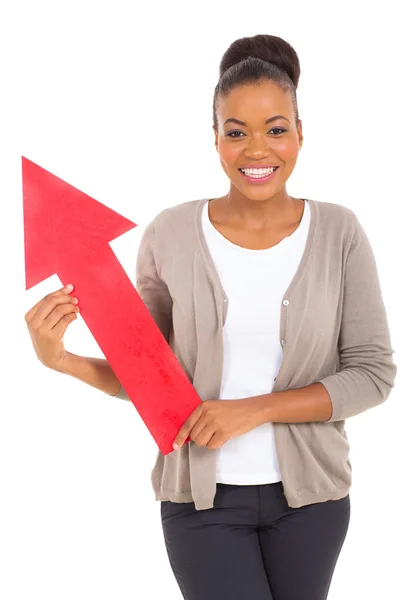 African american woman holding red arrow — Stock Photo, Image