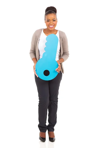 Afro american woman holding key — Stock Photo, Image