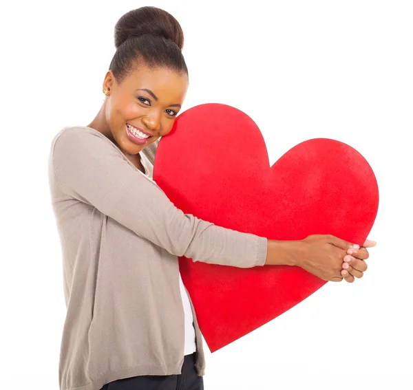 Şirin Afrikalı kadın holding kalp — Stok fotoğraf