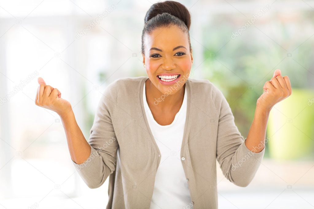 happy african woman indoors