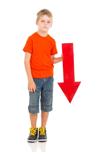 Boy with direction arrow sign pointing down — Stock Photo, Image