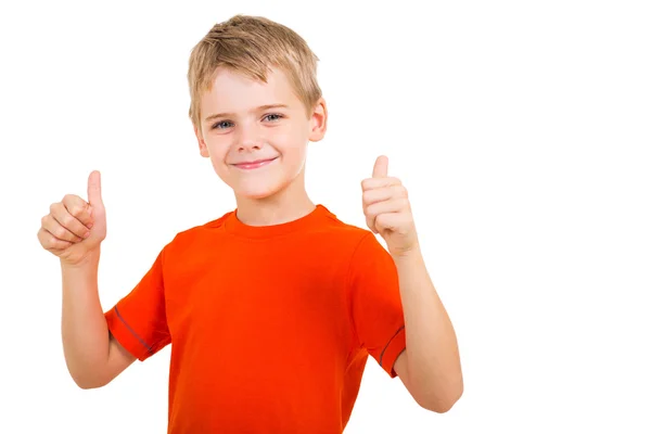 Ung pojke visar tummen upp gest — Stockfoto
