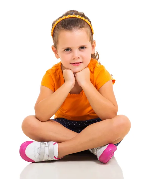 Niña sentada en el suelo — Foto de Stock