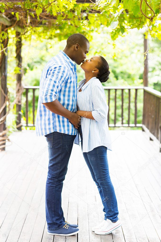 African couple kissing