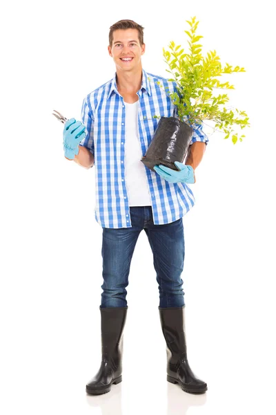 Junger Mann bei der Gartenarbeit — Stockfoto