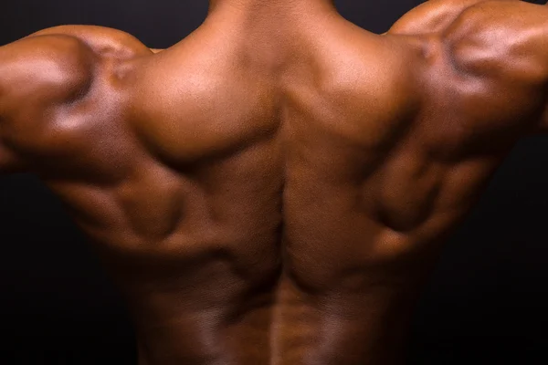 Dos du bodybuilder musculaire africain — Photo