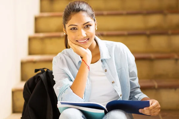 Indian college girl sitting on stairs — Stock Photo, Image