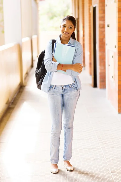 Indiana menina da faculdade segurando livros — Fotografia de Stock