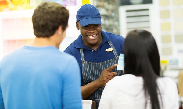 Assistant helping choose paint color — Stock Photo, Image