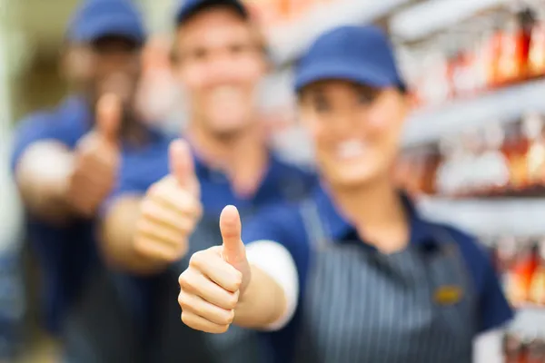 Lavoratori che mostrano pollici in su — Foto Stock