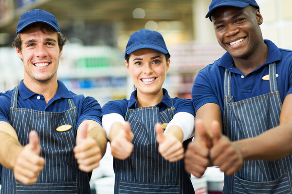 Workers showing thumbs up