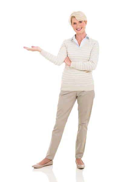 Senior woman welcome gesture — Stock Photo, Image