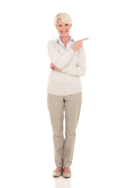 Gorgeous senior woman pointing — Stock Photo, Image